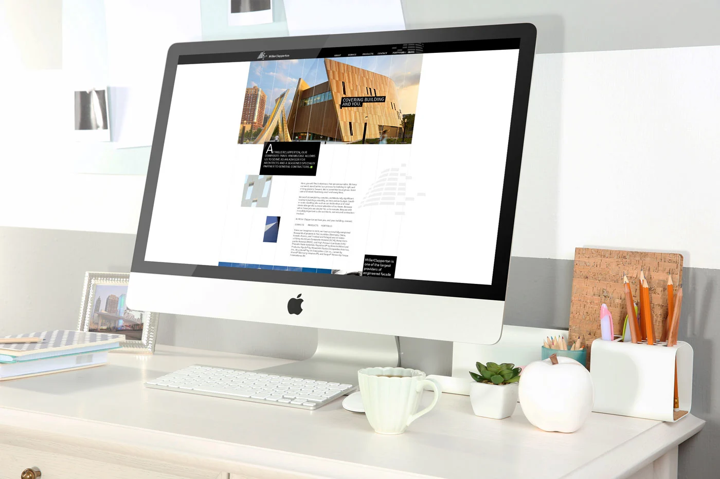 Miller Clapperton website design on MacBook